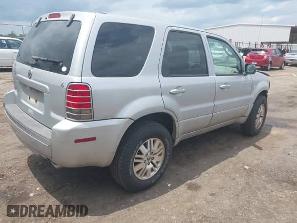 2005 Mercury Mariner Luxury с VIN 4M2YU56155DJ18530, выставлен на аукционе IAAI как лот 42307355 с пробегом 74 905 миль миль и . История ставок и продаж доступна на DreamBid. Изображение 4.