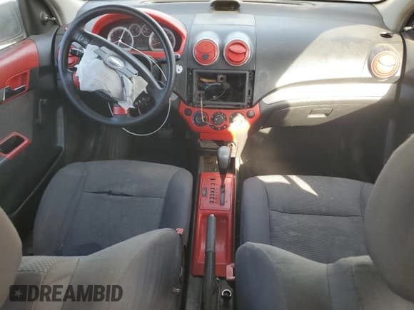 ✅ 2007 Chevrolet Aveo LS • VIN: KL1TD56697B138099 • Lot: 79316494. Wystawiony na Copart z przebiegiem 141 850 mil. Bezpłatny archiwum sprzedaży aukcyjnych z USA i szczegółowy raport historii pojazdu na DreamBid. Zdjęcie 8.