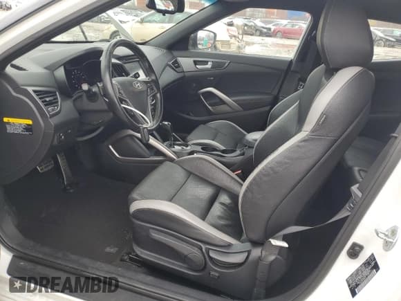 ✅ 2016 Hyundai Veloster Turbo • VIN: KMHTC6AEXGU302685 • Lot: 86426734. Wystawiony na Copart z przebiegiem 59 880 mil. Bezpłatny archiwum sprzedaży aukcyjnych z USA i szczegółowy raport historii pojazdu na DreamBid. Zdjęcie 7.