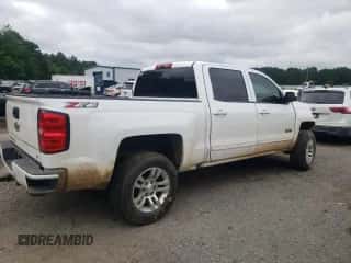 2018 Chevrolet Silverado 1500 LT z VIN 3GCUKREC5JG643220, wystawiony jako Copart lot #58513625 z przebiegiem Nie podano mil oraz Szkoda całkowita • Salvage title. Historia ofert i sprzedaży dostępna na DreamBid. Obrazek 3.