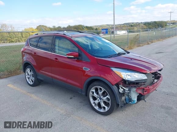✅ 2015 Ford Escape Titanium • VIN: 1FMCU9J9XFUA07957 • Lot: 43559901. Listed on IAAI with 176,659 mi. Free auction sales archive from the USA and detailed vehicle history report at DreamBid. Image 1.