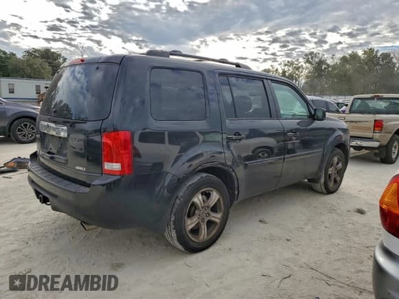 ✅ 2012 Honda Pilot EX-L • VIN: 5FNYF4H7XCB017744 • Lot: 93990825. Listed on Copart with 136,345 mi. Free auction sales archive from the USA and detailed vehicle history report at DreamBid. Image 3.