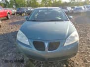 ✅ 2009 Pontiac G6 1SB • VIN: 1G2ZJ57B094239910 • Лот: 71512815. Опубликован ранее на Copart с пробегом 75 321 миль. Бесплатный доступ к архиву аукционных продаж из США и подробный отчёт об истории автомобиля на DreamBid. Изображение 13.