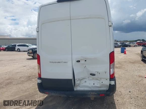 ✅ 2023 Ford Transit Cargo • VIN: 1FTBR3X83PKA70005 • Lot: 42949959. Listed on IAAI with 53,215 mi. Free auction sales archive from the USA and detailed vehicle history report at DreamBid. Image 16.
