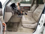 ✅ 2000 Lexus LX 470 • VIN: JT6HT00W6Y0077151 • Lot: 70678424. Wystawiony na Copart z przebiegiem 289 698 mil. Bezpłatny archiwum sprzedaży aukcyjnych z USA i szczegółowy raport historii pojazdu na DreamBid. Zdjęcie 7.