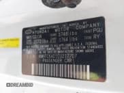 ✅ 2014 Hyundai Veloster • VIN: KMHTC6AD1EU217707 • Lot: 41718176. Wystawiony na IAAI z przebiegiem 191 306 mil. Bezpłatny archiwum sprzedaży aukcyjnych z USA i szczegółowy raport historii pojazdu na DreamBid. Zdjęcie 9.