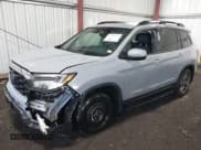 ✅ 2022 Honda Passport EX-L • VIN: 5FNYF7H52NB000679 • Lot: 41449757. Listed on IAAI with 38,672 mi. Free auction sales archive from the USA and detailed vehicle history report at DreamBid. Image 6.