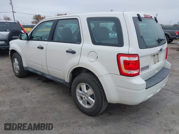 ✅ 2010 Ford Escape XLS • VIN: 1FMCU0C79AKD06626 • Lot: 43894952. Listed on IAAI with 99,581 mi. Free auction sales archive from the USA and detailed vehicle history report at DreamBid. Image 3.