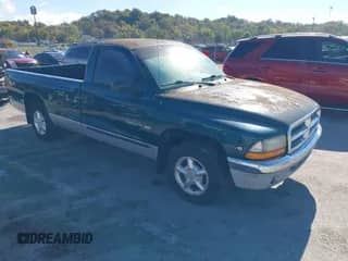 1999 Dodge Dakota SLT with VIN 1B7FL26X6XS267627, listed as a IAAI auction lot 43548128 with 168,647 mi miles and . Bid and sale history available at DreamBid. Image 1.