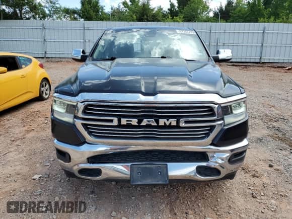 2020 Ram 1500 Laramie with VIN 1C6RREDT0LN265191, listed as a Copart auction lot 57207775 with 124,269 mi miles and Salvage title. Bid and sale history available at DreamBid. Image 5.