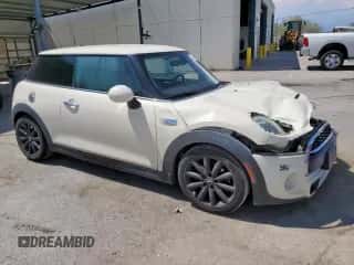 2015 MINI Hardtop S with VIN WMWXP7C56F2A58203, listed as a Copart auction lot 62602855 with 101,679 mi miles and Salvage title. Bid and sale history available at DreamBid. Image 4.