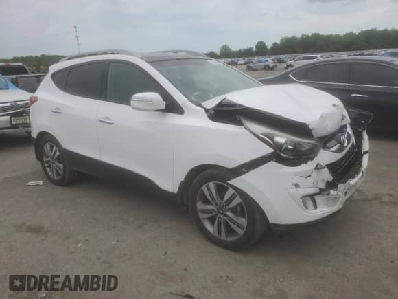 2014 Hyundai Tucson SE z VIN KM8JU3AG7EU821288, wystawiony jako Copart lot #58254885 z przebiegiem 104 614 mil mil oraz Szkoda całkowita • Salvage title. Historia ofert i sprzedaży dostępna na DreamBid. Obrazek 4.