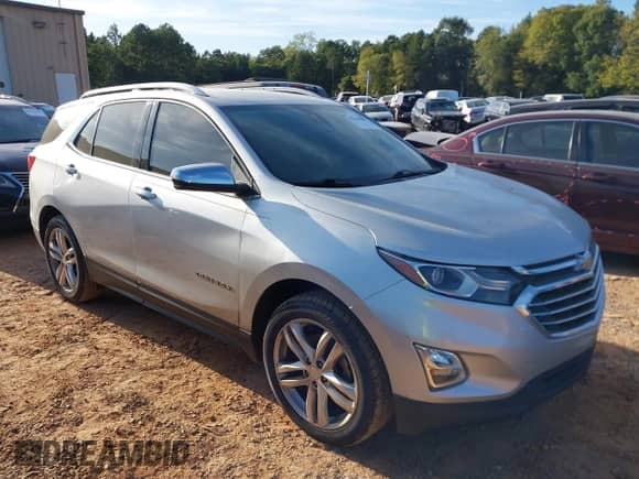 2018 Chevrolet Equinox Premier z VIN 3GNAXNEX5JS509702, wystawiony jako IAAI lot #43364923 z przebiegiem 152 731 mil mil oraz . Historia ofert i sprzedaży dostępna na DreamBid. Obrazek 1.