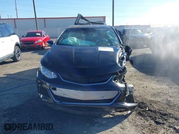 2017 Chevrolet Volt Premier z VIN 1G1RB6S5XHU203648, wystawiony jako IAAI lot #43468353 z przebiegiem Nie podano mil oraz . Historia ofert i sprzedaży dostępna na DreamBid. Obrazek 12.