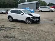 ✅ 2015 Mazda CX-5 Grand Touring • VIN: JM3KE2DY6F0444196 • Lot: 90438305. Wystawiony na Copart z przebiegiem 172 354 mil. Bezpłatny archiwum sprzedaży aukcyjnych z USA i szczegółowy raport historii pojazdu na DreamBid. Zdjęcie 15.