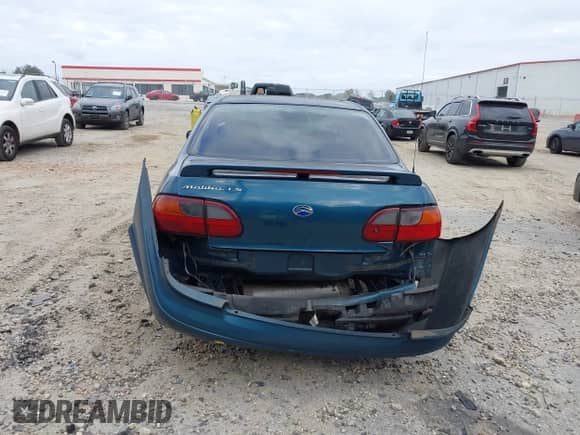 2003 Chevrolet Malibu LS z VIN 1G1NE52J43M679268, wystawiony jako IAAI lot #40734140 z przebiegiem 64 325 mil mil oraz . Historia ofert i sprzedaży dostępna na DreamBid. Obrazek 6.