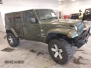 ✅ 2008 Jeep Wrangler Unlimited Sahara • VIN: 1J4GA59158L504309 • Lot: 43292936. Listed on IAAI with 147,545 mi. Free auction sales archive from the USA and detailed vehicle history report at DreamBid. Image 14.