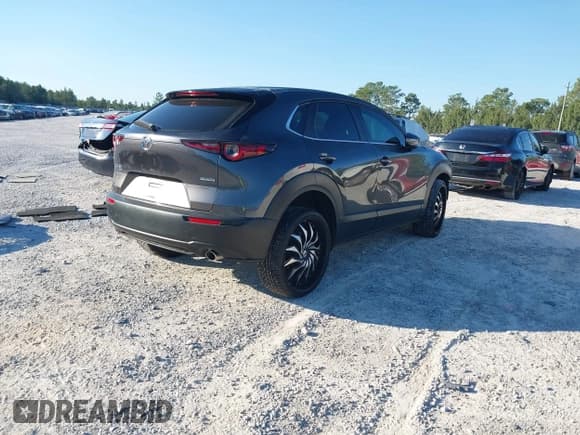 ✅ 2021 Mazda CX-30 Preferred • VIN: 3MVDMBCL7MM223757 • Lot: 43523159. Listed on IAAI with 55,698 mi. Free auction sales archive from the USA and detailed vehicle history report at DreamBid. Image 4.
