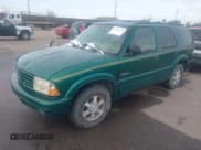 ✅ 1999 Oldsmobile Bravada • VIN: 1GHDT13W7X2711363 • Lot: 41294782. Wystawiony na IAAI z przebiegiem 198 508 mil. Bezpłatny archiwum sprzedaży aukcyjnych z USA i szczegółowy raport historii pojazdu na DreamBid. Zdjęcie 2.