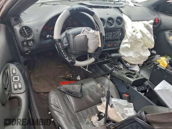 ✅ 1999 Pontiac Firebird Firebird • VIN: 2G2FS22K5X2222920 • Лот: 95157455. Опубликован ранее на Copart с пробегом 210 088 миль. Бесплатный доступ к архиву аукционных продаж из США и подробный отчёт об истории автомобиля на DreamBid. Изображение 8.