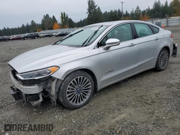 ✅ 2017 Ford Fusion Hybrid Titanium • VIN: 3FA6P0RU2HR287581 • Lot: 82467875. Listed on Copart with 69,229 mi. Free auction sales archive from the USA and detailed vehicle history report at DreamBid. Image 1.