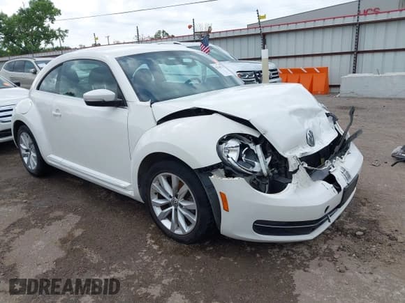 ✅ 2014 Volkswagen Beetle 2.0L TDI w/Sun/Sound/Nav • VIN: 3VWJL7AT1EM621584 • Лот: 42340715. Опубликован ранее на IAAI с пробегом 92 443 миль. Бесплатный доступ к архиву аукционных продаж из США и подробный отчёт об истории автомобиля на DreamBid. Изображение 1.