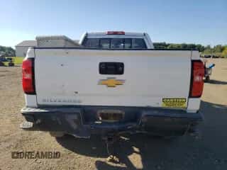 2018 Chevrolet Silverado 1500 Work Truck z VIN 1GCVKNEC3JZ201694, wystawiony jako Copart lot #71517765 z przebiegiem 146 657 mil mil oraz Czysty tytuł • Clean title. Historia ofert i sprzedaży dostępna na DreamBid. Obrazek 6.