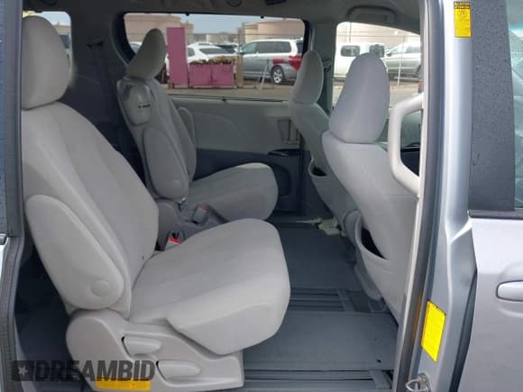 ✅ 2014 Toyota Sienna LE AAS • VIN: 5TDKK3DC0ES467867 • Lot: 42022676. Listed on IAAI with 99,959 mi. Free auction sales archive from the USA and detailed vehicle history report at DreamBid. Image 8.