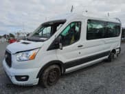 ✅ 2021 Ford Transit Passenger XL • VIN: 1FBAX2C87MKA03621 • Лот: 80461454. Опубликован ранее на Copart с пробегом 87 785 миль. Бесплатный доступ к архиву аукционных продаж из США и подробный отчёт об истории автомобиля на DreamBid. Изображение 1.