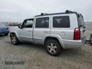 ✅ 2010 Jeep Commander Sport • VIN: 1J4RG4GK2AC121821 • Lot: 57793545. Listed on Copart with 171,405 mi. Free auction sales archive from the USA and detailed vehicle history report at DreamBid. Image 2.