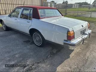 ✅ 1984 Oldsmobile Delta • VIN: 1G3AY69Y8EM716945 • Лот: 42450381. Опубликован ранее на IAAI с пробегом Не указан. Бесплатный доступ к архиву аукционных продаж из США и подробный отчёт об истории автомобиля на DreamBid. Изображение 3.