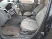 ✅ 2013 Chevrolet Traverse LT • VIN: 1GNKRJKD6DJ138816 • Lot: 71047754. Wystawiony na Copart z przebiegiem 158 837 mil. Bezpłatny archiwum sprzedaży aukcyjnych z USA i szczegółowy raport historii pojazdu na DreamBid. Zdjęcie 7.