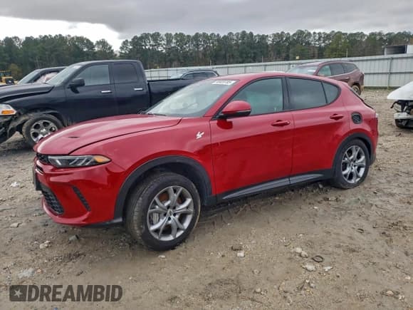 ✅ 2024 Dodge Hornet R/T • VIN: ZACPDFCW4R3A33619 • Lot: 95920785. Listed on Copart with 22,174 mi. Free auction sales archive from the USA and detailed vehicle history report at DreamBid. Image 1.