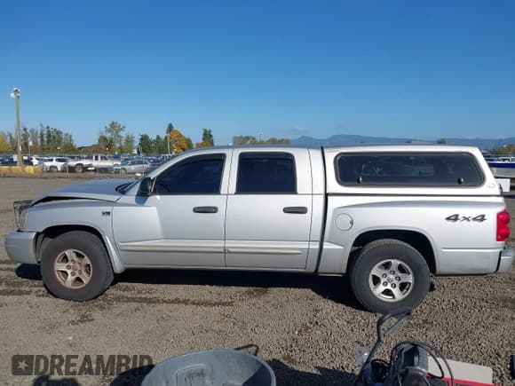 ✅ 2005 Dodge Dakota SLT • VIN: 1D7HW48N95S110474 • Lot: 43513144. Listed on IAAI with 209,765 mi. Free auction sales archive from the USA and detailed vehicle history report at DreamBid. Image 15.