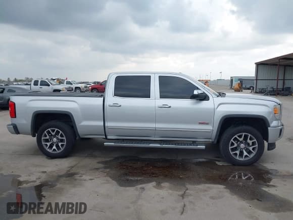 ✅ 2014 GMC Sierra 1500 SLT • VIN: 3GTU2VEC7EG103186 • Lot: 43715336. Listed on IAAI with 218,583 mi. Free auction sales archive from the USA and detailed vehicle history report at DreamBid. Image 13.