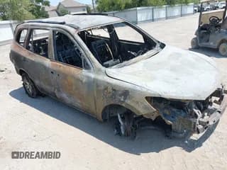 ✅ 2012 Hyundai Santa Fe SE • VIN: 5XYZH4AG2CG145574 • Lot: 42950662. Listed on IAAI with 257,515 mi. Free auction sales archive from the USA and detailed vehicle history report at DreamBid. Image 1.