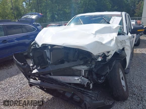 ✅ 2023 Toyota Tacoma SR • VIN: 3TYSX5EN1PT020033 • Lot: 43117720. Listed on IAAI with 33,000 mi. Free auction sales archive from the USA and detailed vehicle history report at DreamBid. Image 6.