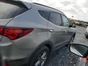 ✅ 2018 Hyundai Santa Fe 2.4L • VIN: 5XYZTDLB6JG547997 • Лот: 85646255. Опубликован ранее на Copart с пробегом 74 144 миль. Бесплатный доступ к архиву аукционных продаж из США и подробный отчёт об истории автомобиля на DreamBid. Изображение 3.