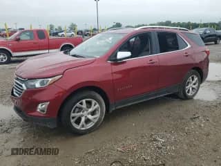 2020 Chevrolet Equinox Premier z VIN 2GNAXXEV2L6121712, wystawiony jako Copart lot #66229645 z przebiegiem 51 397 mil mil oraz Szkoda całkowita • Salvage title. Historia ofert i sprzedaży dostępna na DreamBid. Obrazek 1.