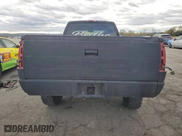 1997 Chevrolet Silverado 3500 with VIN 1GCHC33J3VF052789, listed as a Copart auction lot 86842835 with 137,985 mi miles and Salvage title. Bid and sale history available at DreamBid. Image 6.