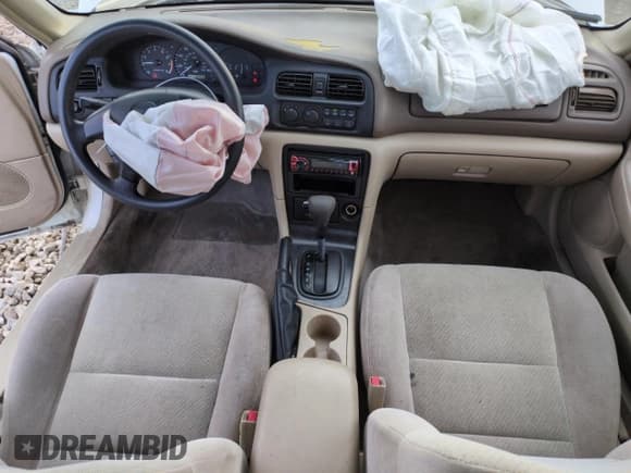 ✅ 1999 Mazda 626 ES • VIN: 1YVGF22C9X5887587 • Лот: 46346305. Опубликован ранее на Copart с пробегом 92 715 миль. Бесплатный доступ к архиву аукционных продаж из США и подробный отчёт об истории автомобиля на DreamBid. Изображение 8.