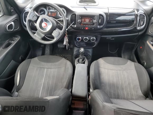 ✅ 2015 FIAT 500L Urbana Trekking • VIN: ZFBCFADH8FZ031831 • Lot: 44836065. Listed on Copart with 171,185 mi. Free auction sales archive from the USA and detailed vehicle history report at DreamBid. Image 8.