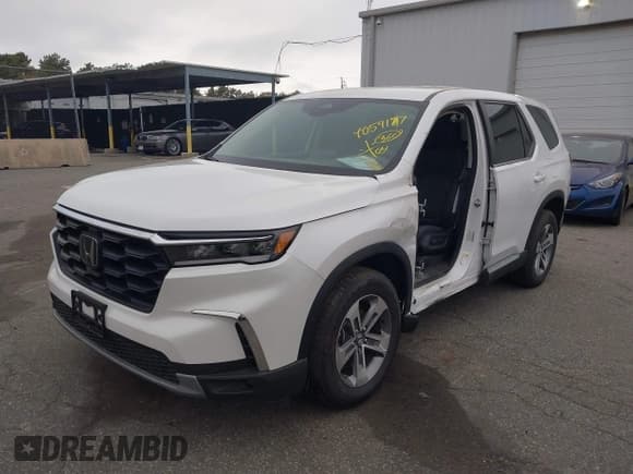 ✅ 2023 Honda Pilot EX-L • VIN: 5FNYG1H58PB016138 • Lot: 40591717. Wystawiony na IAAI z przebiegiem 10 068 mil. Bezpłatny archiwum sprzedaży aukcyjnych z USA i szczegółowy raport historii pojazdu na DreamBid. Zdjęcie 2.