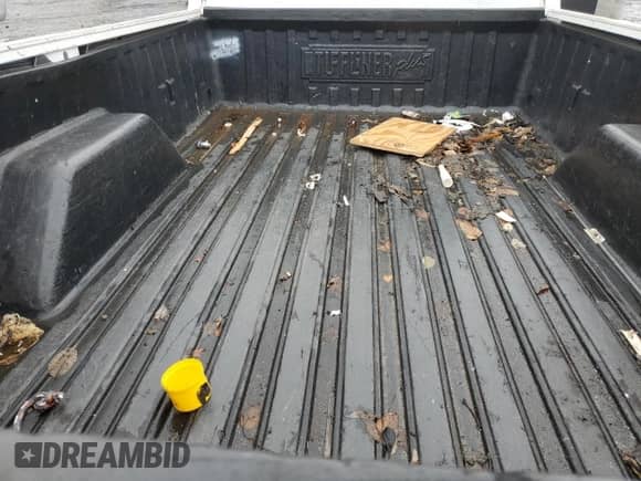 2002 Chevrolet Silverado 1500 z VIN 1GCEC14W12Z185739, wystawiony jako Copart lot #71419234 z przebiegiem 131 034 mil mil oraz Czysty tytuł • Clean title. Historia ofert i sprzedaży dostępna na DreamBid. Obrazek 10.