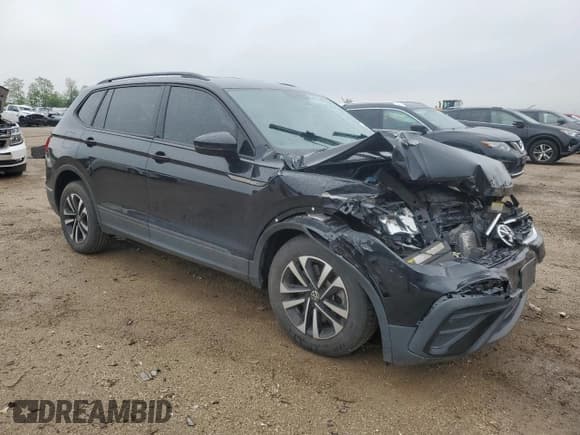 ✅ 2022 Volkswagen Tiguan S • VIN: 3VV0B7AX9NM058029 • Lot: 57146035. Listed on Copart with 40,070 mi. Free auction sales archive from the USA and detailed vehicle history report at DreamBid. Image 4.