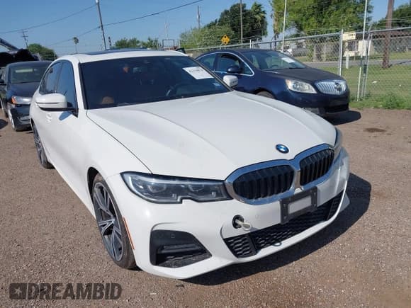 ✅ 2022 BMW 3 Series 330i • VIN: 3MW5R1J06N8C42821 • Lot: 42234878. Listed on IAAI with 60,888 mi. Free auction sales archive from the USA and detailed vehicle history report at DreamBid. Image 1.