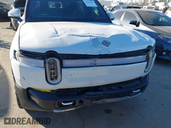 ✅ 2023 Rivian R1S Adventure • VIN: 7PDSGABA6PN017536 • Lot: 43881106. Wystawiony na IAAI z przebiegiem 21 072 mil. Bezpłatny archiwum sprzedaży aukcyjnych z USA i szczegółowy raport historii pojazdu na DreamBid. Zdjęcie 6.