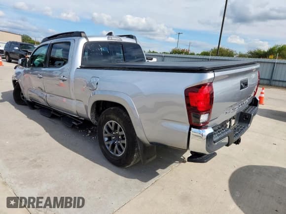 ✅ 2021 Toyota Tacoma SR5 • VIN: 3TYBZ5DN2MT000123 • Lot: 84049645. Listed on Copart with 48,815 mi. Free auction sales archive from the USA and detailed vehicle history report at DreamBid. Image 2.