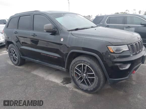 2017 Jeep Grand Cherokee Trailhawk with VIN 1C4RJFLG9HC631016, listed as a IAAI auction lot 43352680 with 82,773 mi miles and . Bid and sale history available at DreamBid. Image 1.