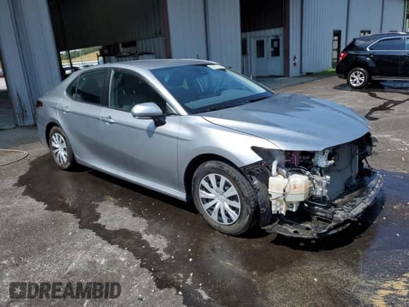 2022 Toyota Camry Hybrid LE z VIN 4T1C31AK5NU582117, wystawiony jako Copart lot #81484685 z przebiegiem 78 823 mil mil oraz Czysty tytuł • Clean title. Historia ofert i sprzedaży dostępna na DreamBid. Obrazek 4.